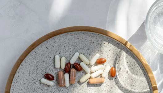 pills-and-capsules-on-plate-GettyImages-1679667577-3000x2000.jpg