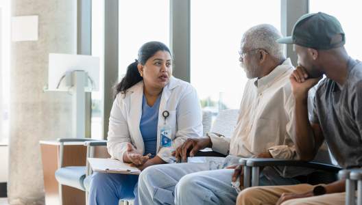 senior-man-and-son-with-doctor-GettyImages-1403133468-3000x2000-sm.jpg