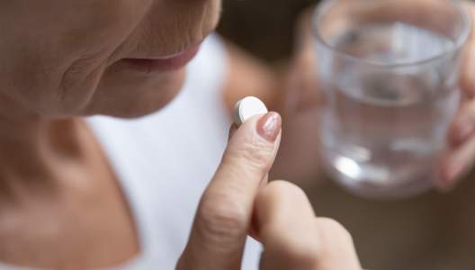 senior-woman-taking-pill-GettyImages-1271502143-3000x2000.jpg
