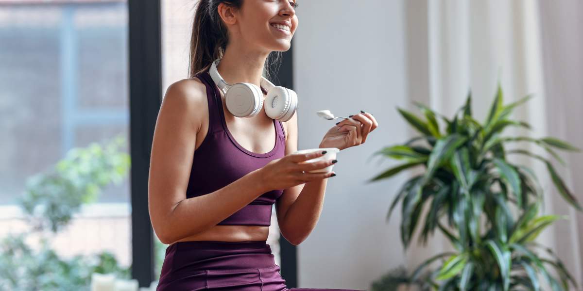 woman-eating-a-yogurt-GettyImages-1362879567-3000x2000.jpg