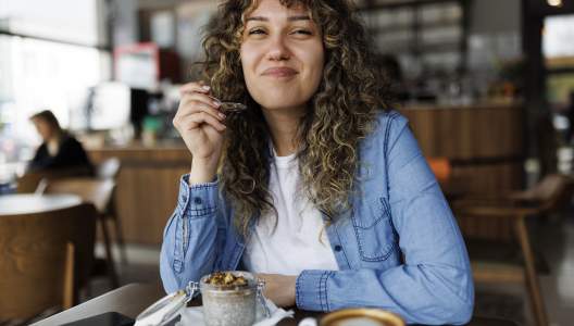 woman-eating-chia-pudding-GettyImages-1494295938-3000x2000.jpg