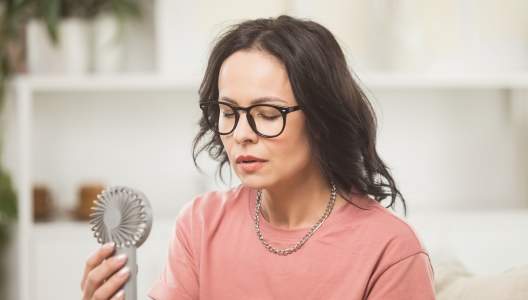 woman-having-a-hot-flash-GettyImages-1644736059-3000x2000.jpg
