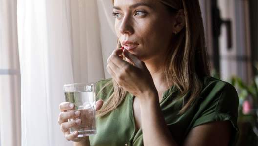 woman-taking-her-medication-01-GettyImages-2000363181.jpg