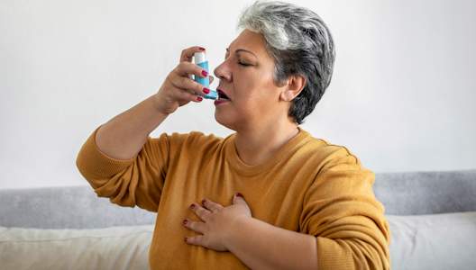 woman-using-asthma-inhaler-GettyImages-1475236305-3000x2000.jpg